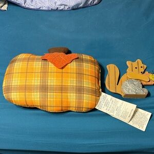 Plaid Orange Pumpkin Pillow with Felt Leaf and wooden squirrel decor